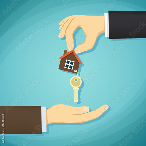 Man holds in his hand the keys to the house. Deal with real esta