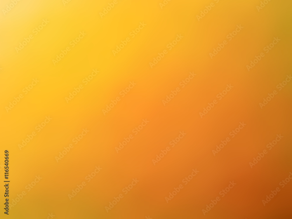 Abstract gradient orange yellow colored blurred background