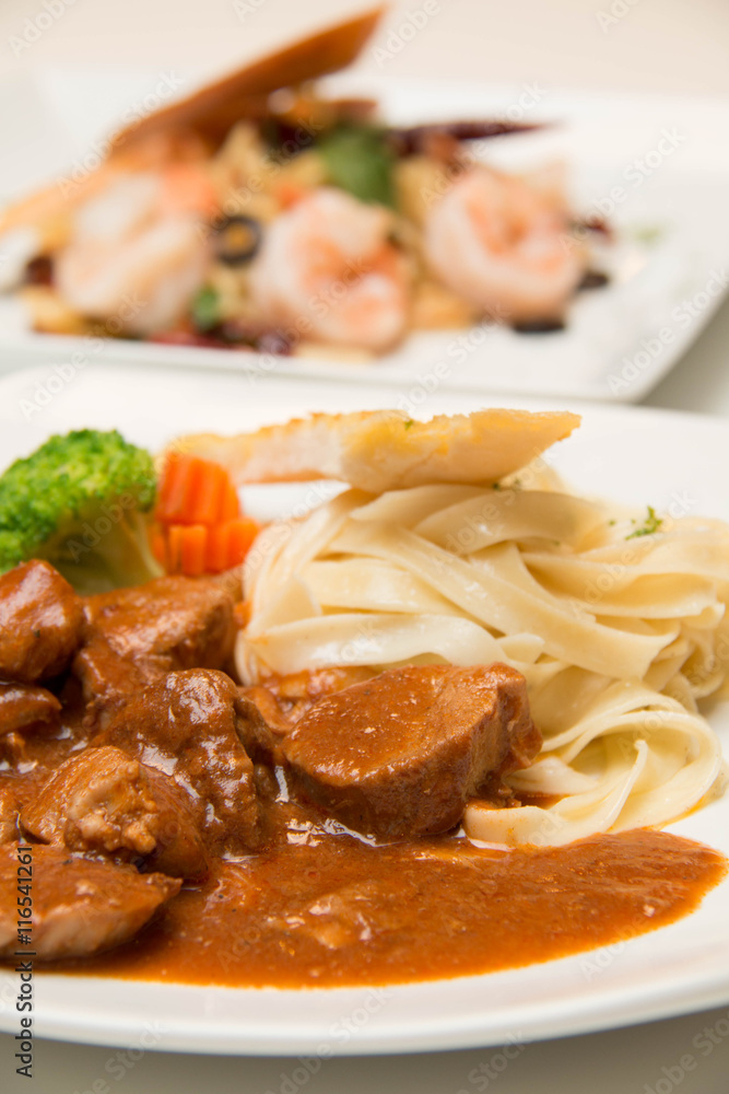 Pork stew with pasta