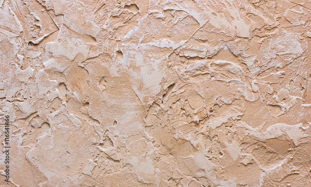 textured plaster - texture in brown and beige tones. Decorative plaster texture on the wall - art brush stroke background textured plaster - texture in brown and beige tones. Decorative plaster texture on the wall - art brush stroke background