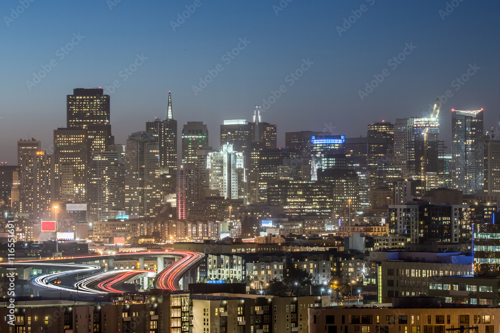 Highway to San Francisco. High angle shot of San Francisco downtown and highway I-280, dusk from Potrero Hill.
