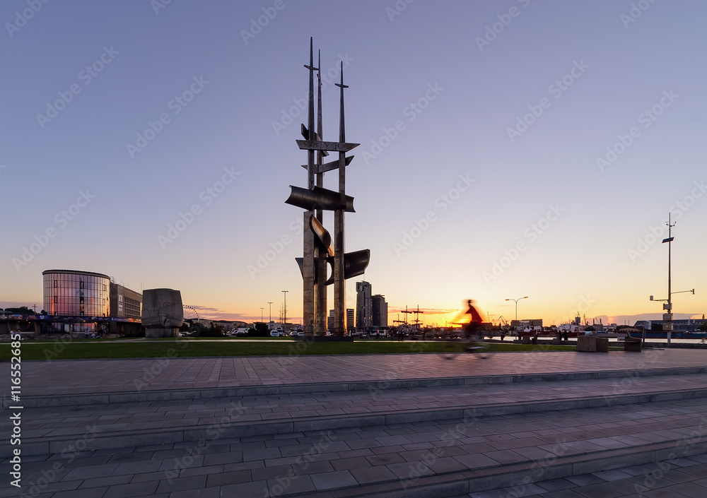 Fototapeta premium Sails monument on Baltic Sea square at sunset, Gdynia