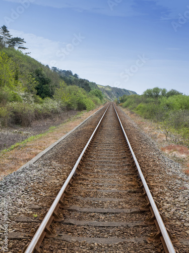 Railway track through countryside UK