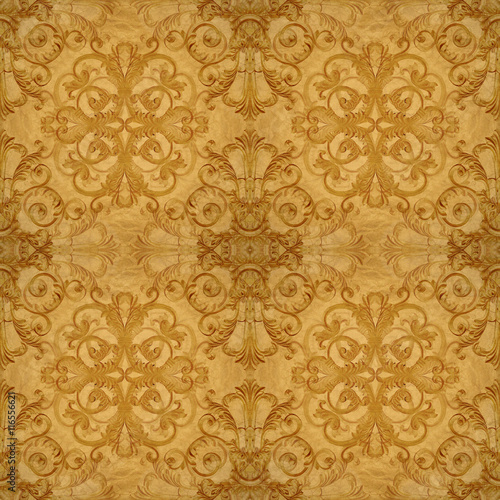 Gold ornament  flower vintage patten in old paper background photo