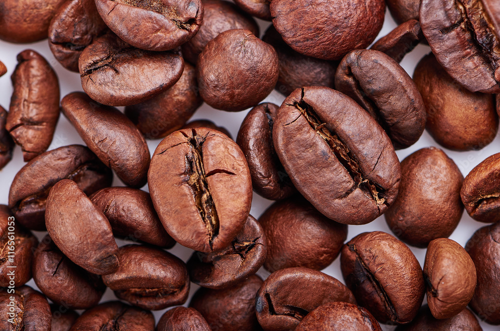 Fototapeta premium large grain of coffee on a white background isolated
