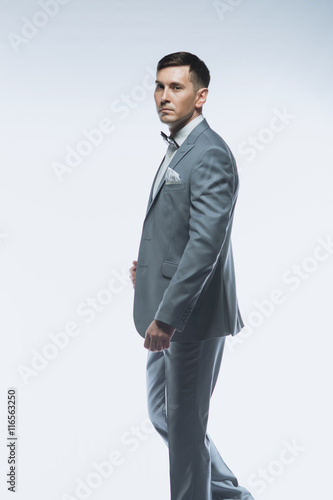 Portrait of a elegant handsome business man on white background
