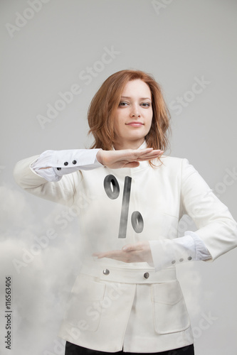 Woman showing symbol of percent. Bank Deposit or Sale concept.