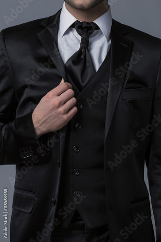 Close-up on Businessman in Black Suit on