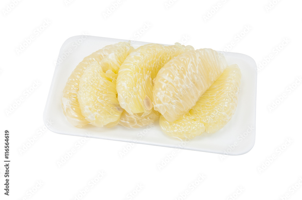 Green pomelo citrus fruit on foam on white background Green pomelo citrus fruit on foam on white background