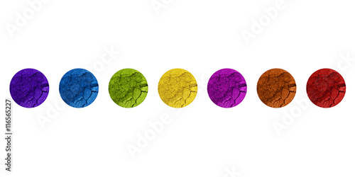 make-up set of crushed colorful powder eyeshadow powder on white background
