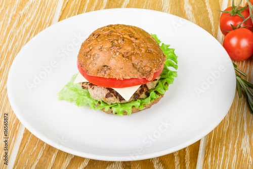 Fototapeta Naklejka Na Ścianę i Meble -  Burger on white plate