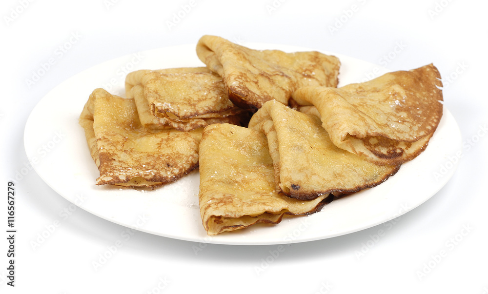 Traditional Russian pancakes on a white plate Traditional Russian pancakes on a white plate