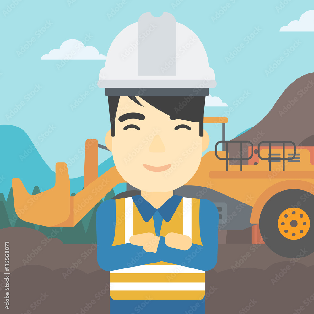 Miner with mining equipment on background.