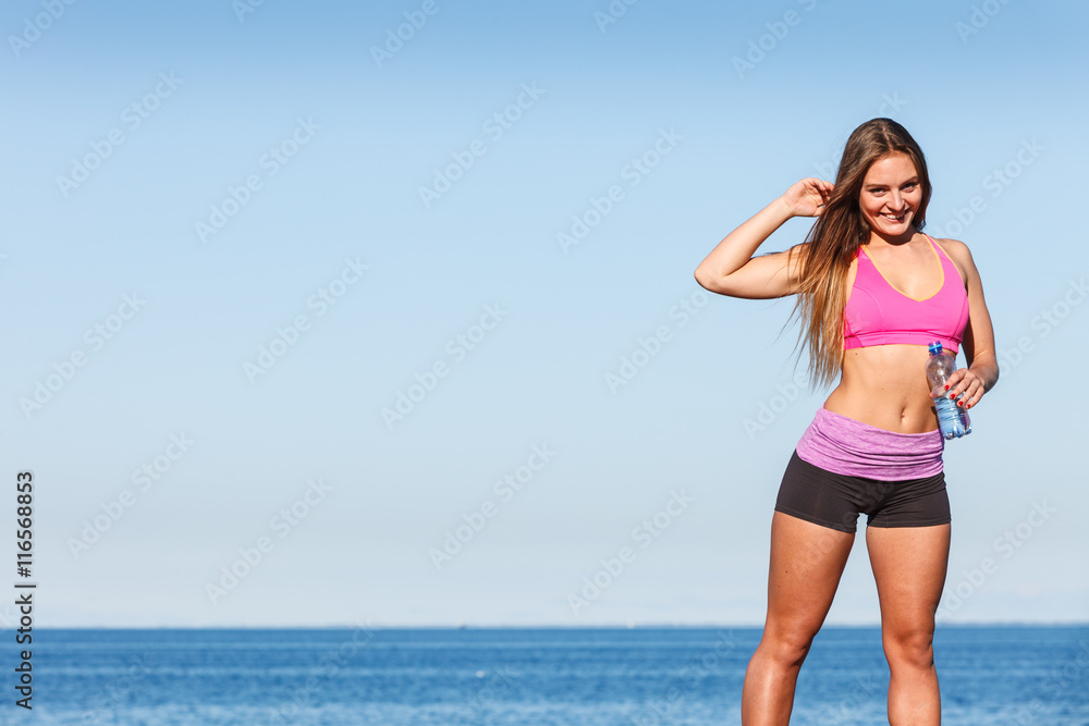 Woman drinking water after sport gym outdoor Woman drinking water after sport gym outdoor