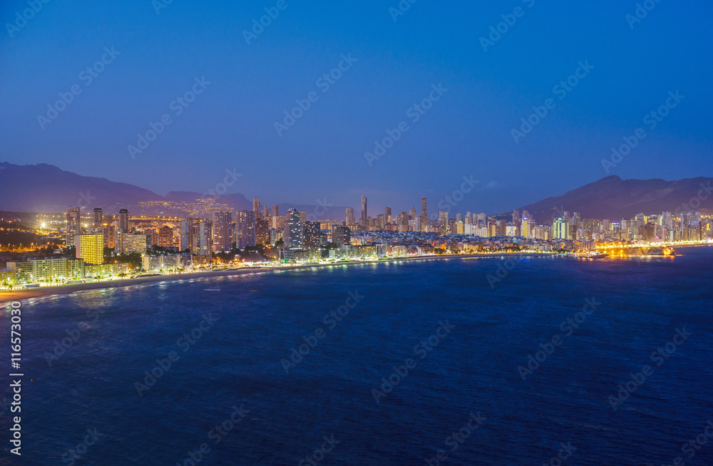 Night view of the coastline in Benidorm with city lights Night view of the coastline in Benidorm with city lights
