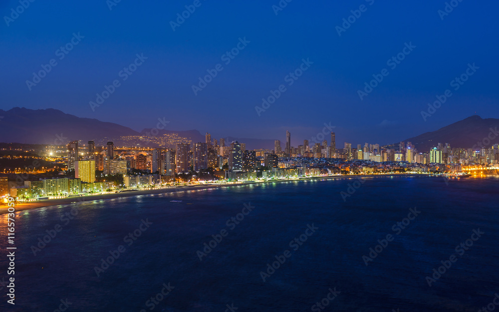 Night view of the coastline in Benidorm with city lights