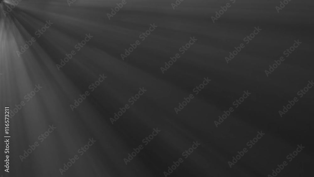 Computer graphic of illuminating rays from the top, left corner of the frame Computer graphic of illuminating rays from the top, left corner of the frame
