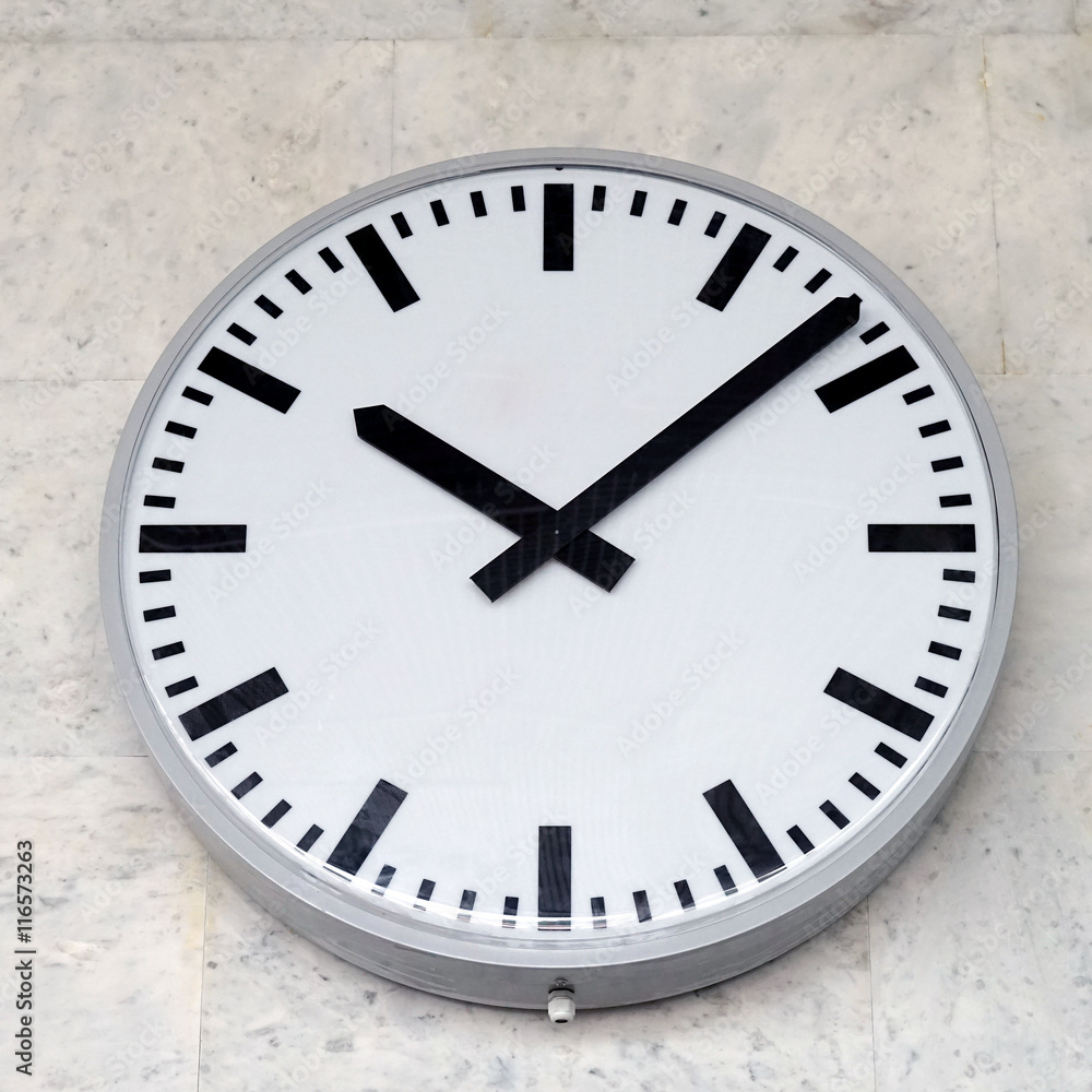 Modern round metal wall clock..