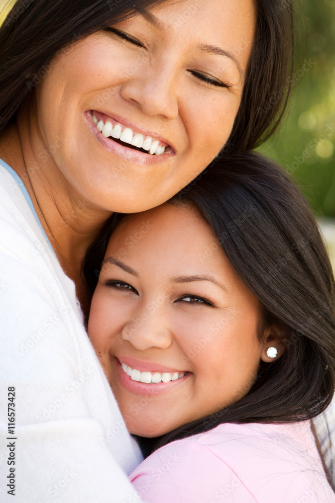 Asian mother and teenage daughter. Asian mother and teenage daughter.