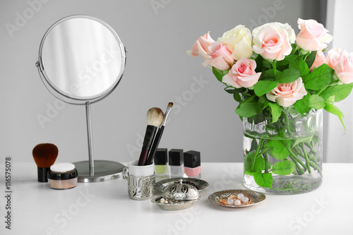 Cosmetic set on light dressing table