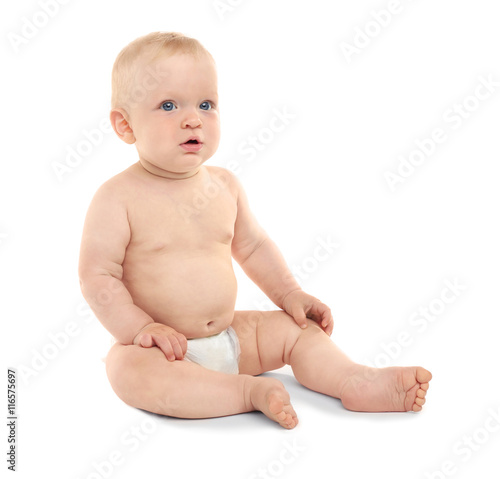 Cute baby sitting on white ...