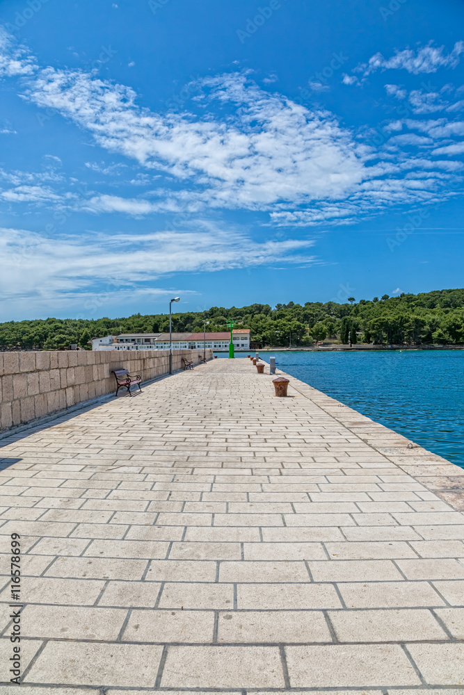 View of the the main pier in Luka on island Prvic in Sibenik archipelago, Croatia.