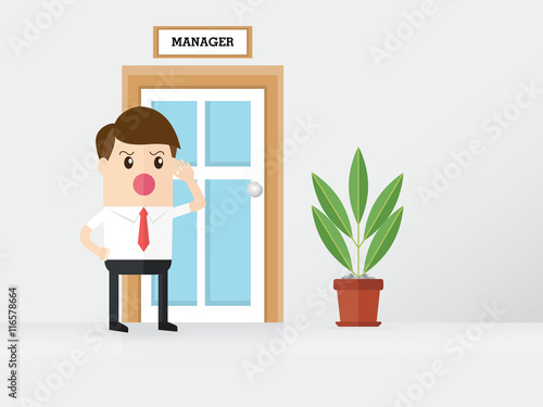 businessman is eavesdropping on a door