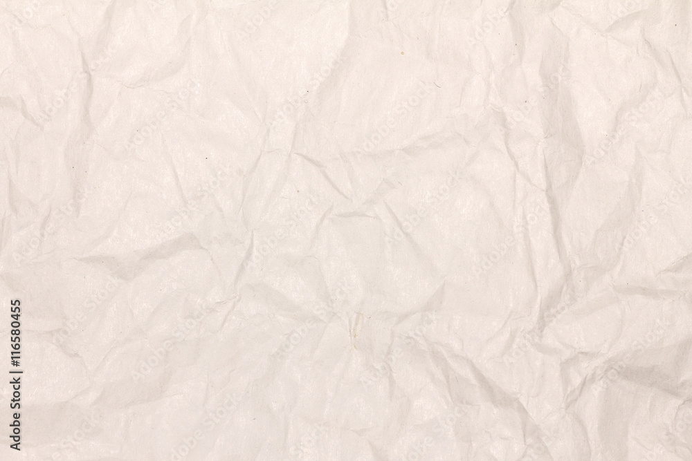 Crumpled light brown paper texture or paper background for design with copy space for text or image. Crumpled light brown paper texture or paper background for design with copy space for text or image.
