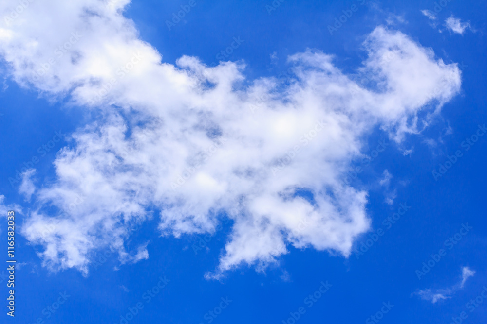 Blue sky background with white clouds. The vast blue sky and clouds sky on sunny day. White fluffy clouds in the blue sky. Blue sky background with white clouds. The vast blue sky and clouds sky on sunny day. White fluffy clouds in the blue sky.