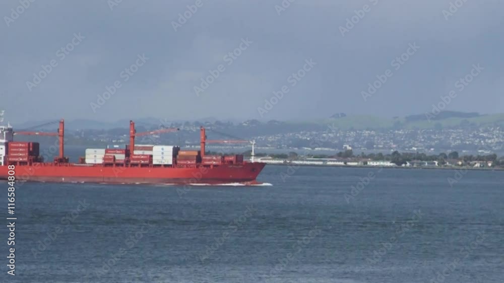 Red cargo ship in the waters of San Francisco Bay, California Red cargo ship in the waters of San Francisco Bay, California
