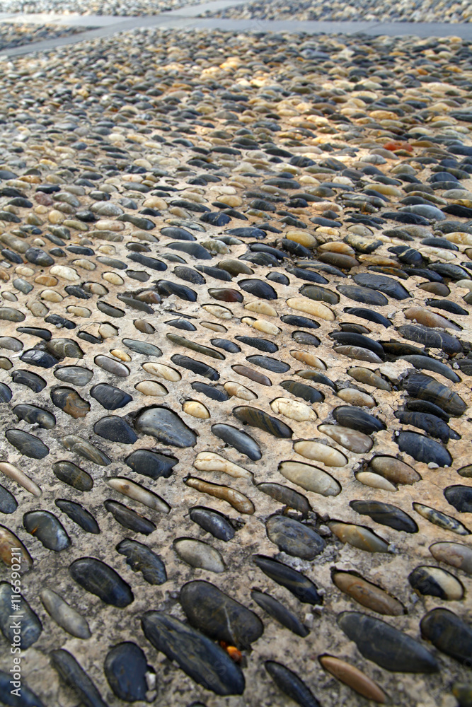 Fototapeta premium Circular symbol, cobblestone streets