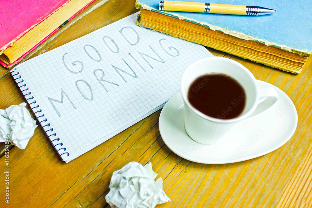 Coffee and pen in the wooden table Coffee and pen in the wooden table