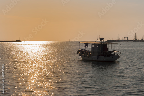 .Professional fishing boat goes to work © Franco Nadalin