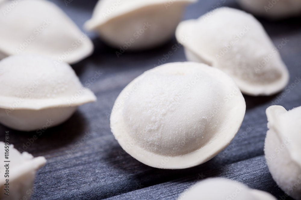 frozen meat dumplings close up selective focus background