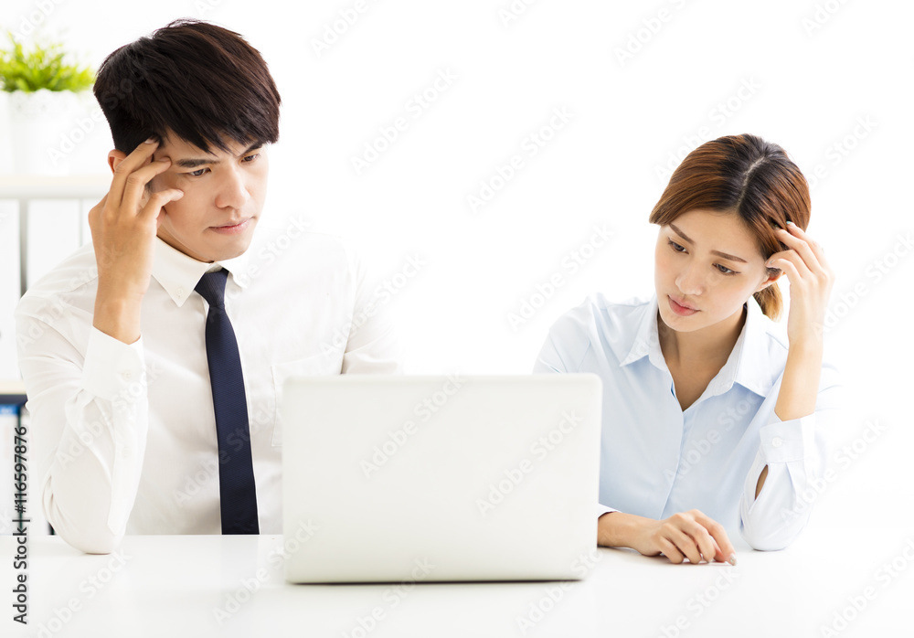 business man and woman solving problem in office business man and woman solving problem in office
