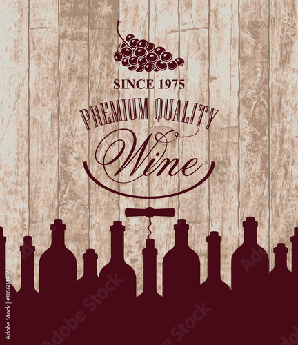 banner for the wine store or restaurant with bottles and grapes on the background of wooden boards