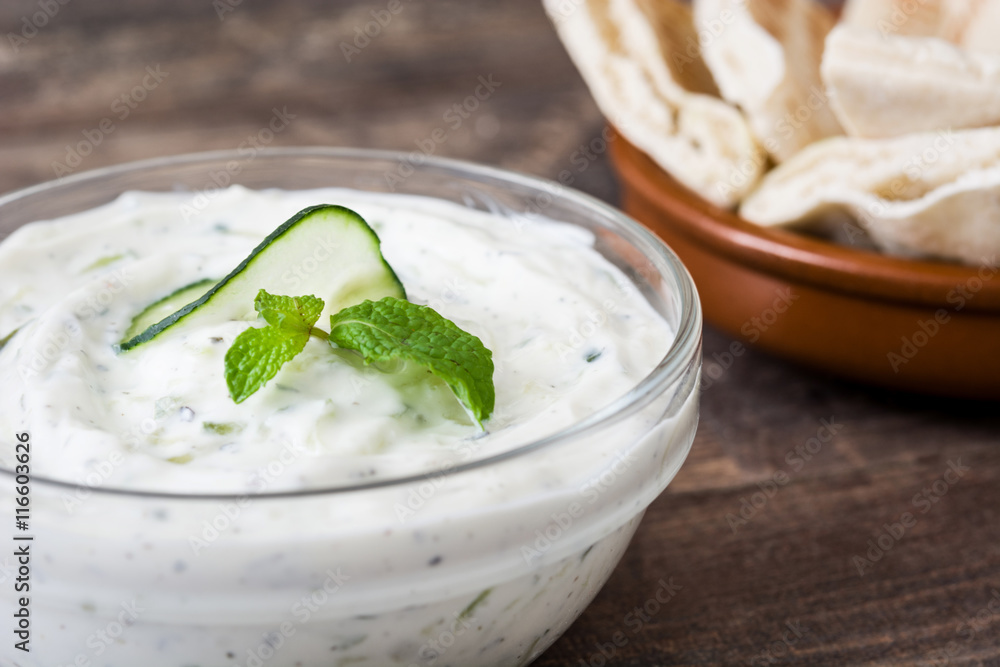 Tzatziki in bowl and ingredients
Tzatziki in bowl and ingredients