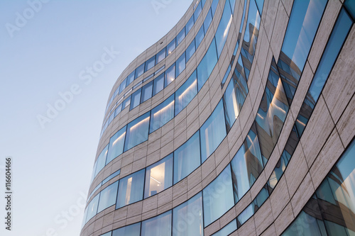 Modern, Curving Window Glass Tile Architecture in Düsseldorf with Blue Sky
