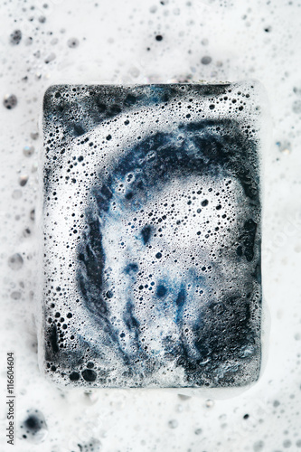 Close-up of black coal soap bar