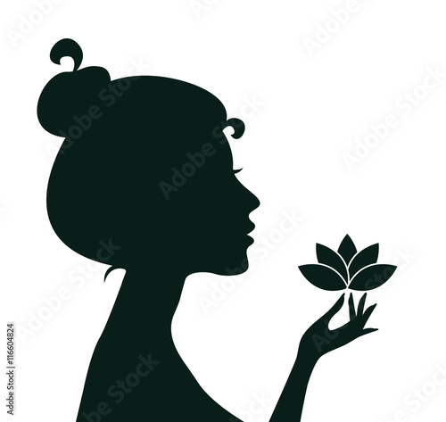 Woman holding lotus flower