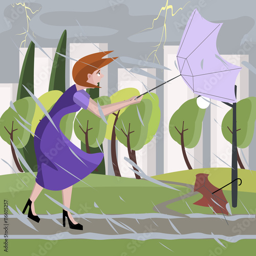 woman walking at summer storm