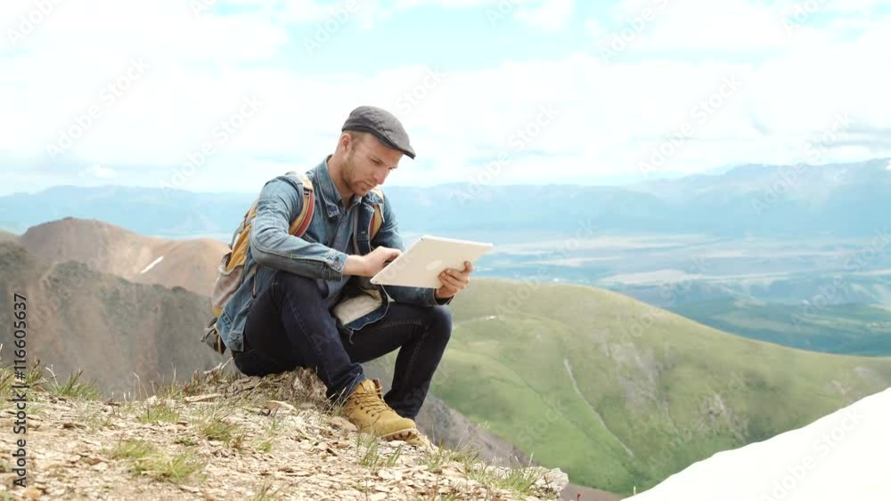 man working outdoors with tablet computer man working outdoors with tablet computer