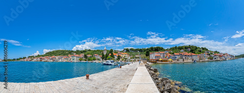 Small boats anchored in the Prvic Luka port in Croatia  panoramic view from the the main pier.