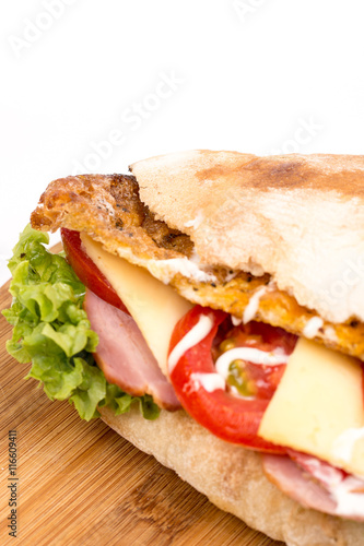 Closeup macro bread sandwich meat tomato cheese