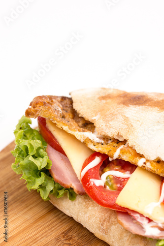 Closeup bread sandwich with lettuce meat tomato