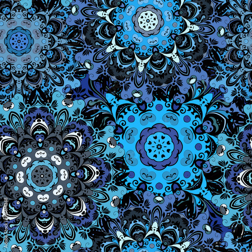 Deep blue colored seamless pattern with eastern floral orament. Floral oriental design in aztec, turkish, pakistan, indian, chinese, japanese style. photo