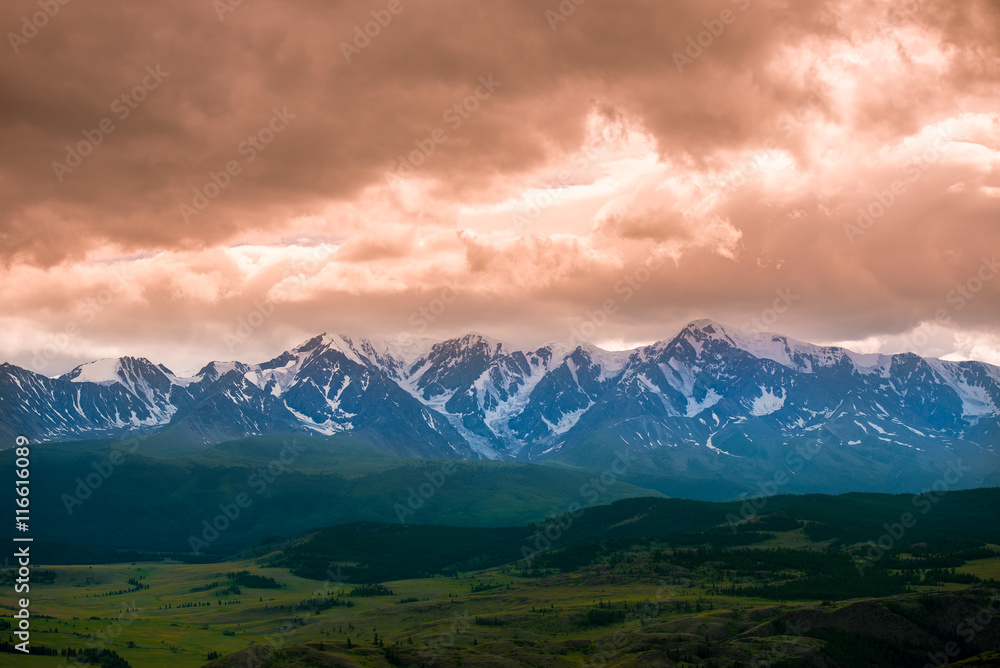 beautiful landscape of mountains and steppe on sunset background