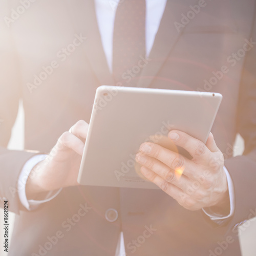 Office worker holding tablet
