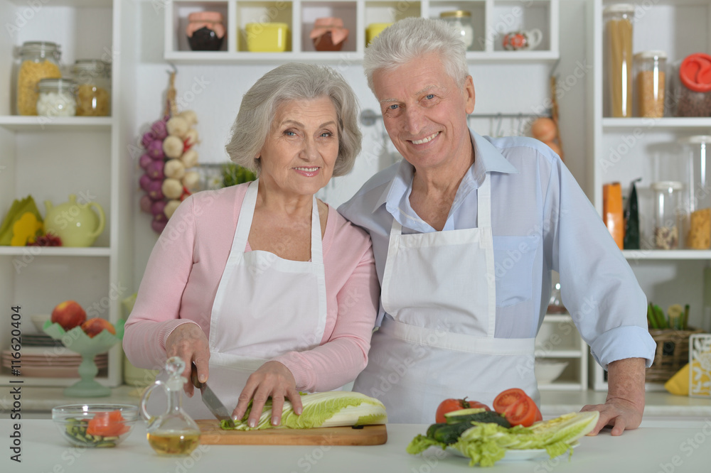 senior man and woman in the kitchen senior man and woman in the kitchen