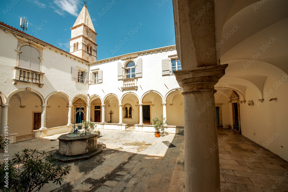 Courtyard of Minorite monastery of St. Francis in Piran city in Slovenia